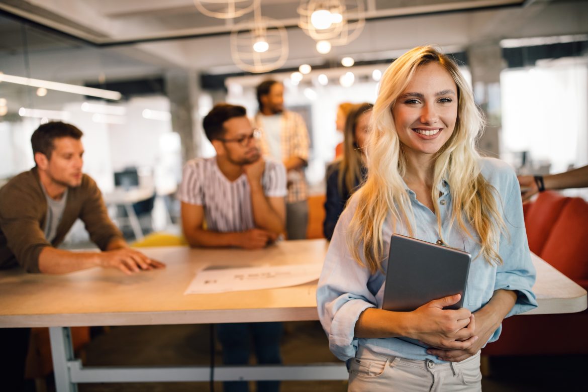 Successful company with happy employees in modern office