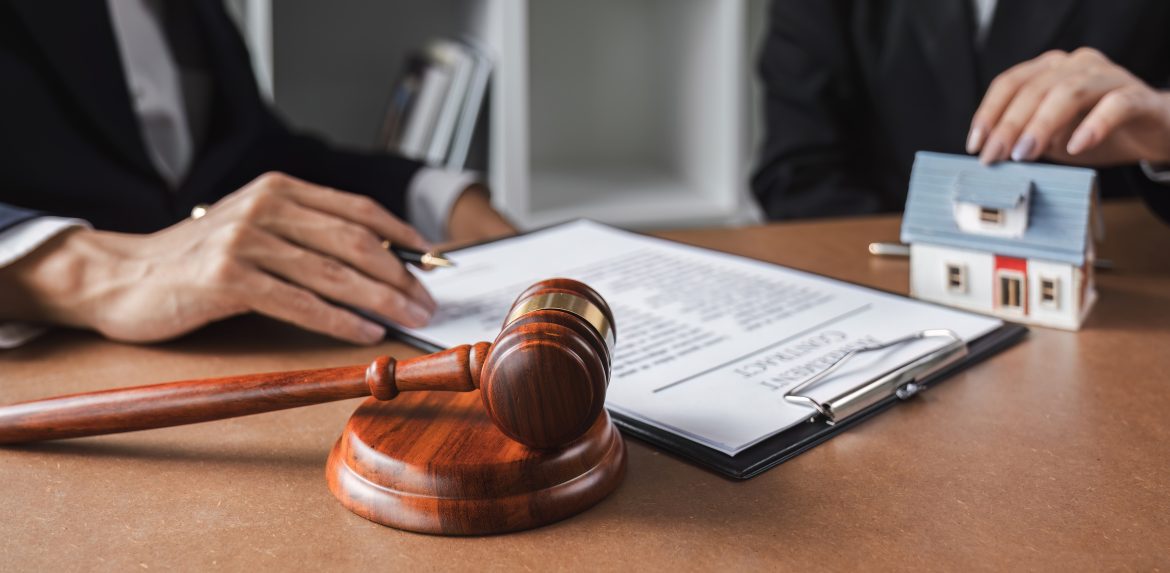 Real estate businessman consults a lawyer against the law relating to houses, land and real estate