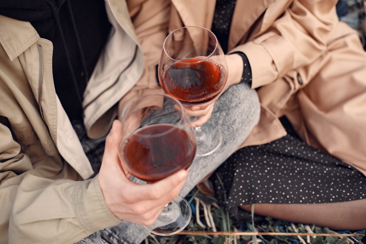 Beautiful couple spend time in a autumn field