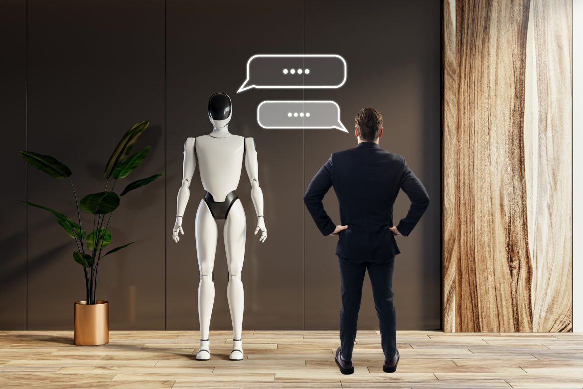 Robot interacting with businessman in a modern office setting.