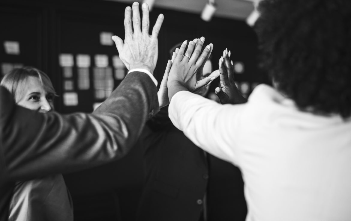 business-team-giving-high-five